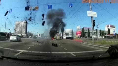 Dashcam video captures missile falling near Kyiv car