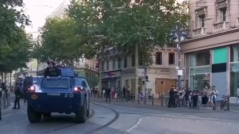 In Marseille Armoured vehicles of the Gendarmerie patrol the city centre.