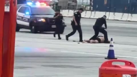 Shirtless, Shoeless Dude Captured on LAX Tarmac After Apparently Missing Flight