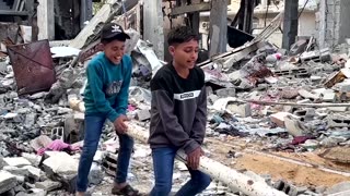 Children play in rubble of Gaza for Eid holiday