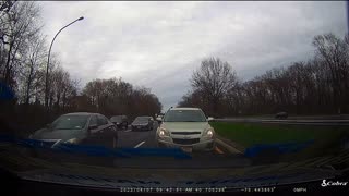 Sudden Traffic Stop Causes Biker To Crash Into Car