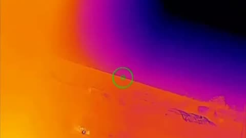 Russian fighters shoot down a Ukrainian drone using a machine gun with a thermal imaging sight.