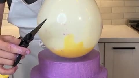 When the balloon POPS, the icing covers the CAKE PERFECTLY..