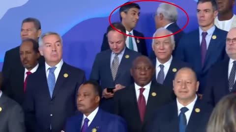 Cop27: Rishi Sunak stands on back row for family photo as PM mingles with world leaders