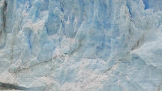Ice Chunk Falls from Glacier