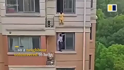 Brave man in China rescues 4-year-old girl hanging from window