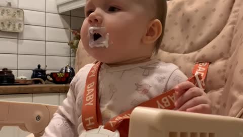 Cute baby eating yummy