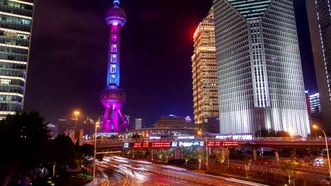 Shanghai city traffic and illuminated a tower