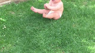 Cute Baby Hates Sitting on Grass