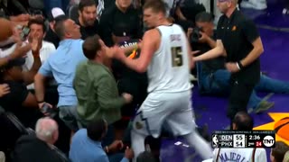 Oh no he didn't - Nikola Jokic trying to get the ball from the Suns fans