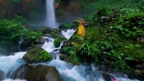 the magical beauty of the waterfall 🌿🌴