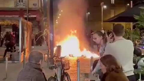 French "liberals" drink while their country burns at the hands of foreign invaders.