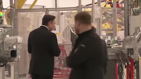 Watch Elon Musk dances again at Tesla factory opening.