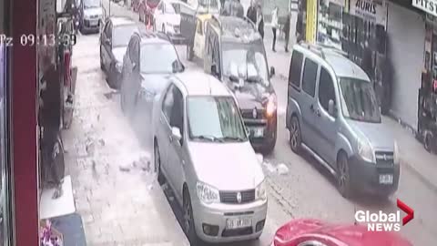 Turkey storm: Man evades falling concrete in high winds