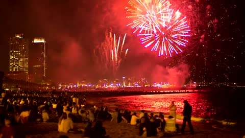 People seeing fireworks in the beach