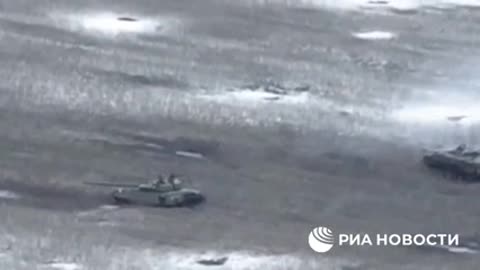 Russian armored vehicles attacking Ukrainian positions
