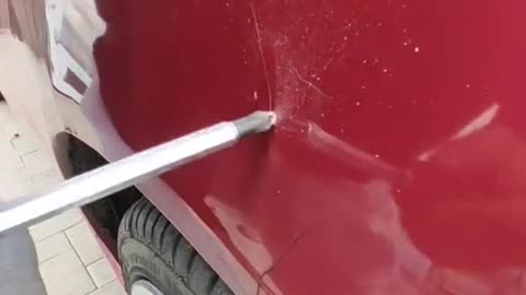 Punch a hole in the sheet metal with a screwdriver