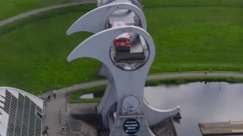 The Falkirk Wheel in Scotland is a rotating boat lift that links the Forth and Clyde Canal to the Union Canal