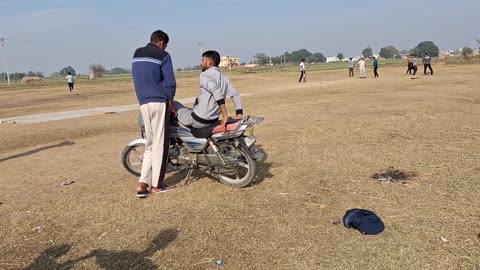 Cricket match village ground