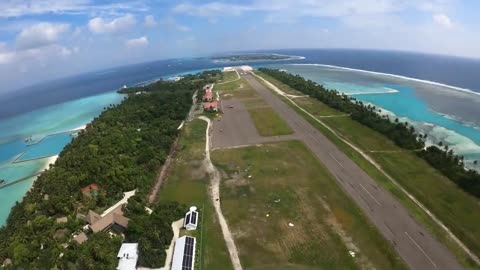 Wingsuit Flying over the Maldives Islands