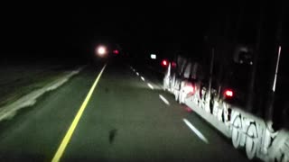 Passing a car hauler at night: 112 km/hr.