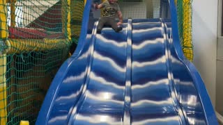 Toddler Bumps Head Going Down Slide