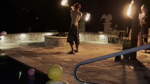 fire show by pool