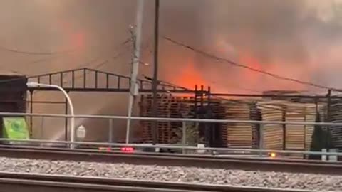 Numerous Firefighters are battling a massive pallet Warehouse fire in Chicago, Illinois