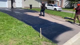 Professional Asphalt Spray Sealing: “The Sunny Windy Sealed One” Top Coats Pavement Maintenance