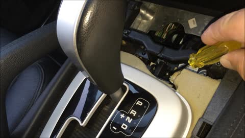 How to Manually Release the Transmission Selector Lever in a Porsche Cayenne