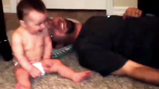 Babies play with puppies