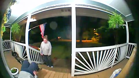 Two Women Burst into Laughter as One Unexpectedly Falls on Porch Stairs