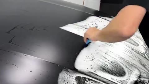 This is how paint protection film is added to cars