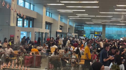 Travelers Delayed By Global Outages At Singapore Airport