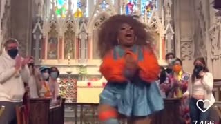 Drag queen Brita Filter performing in a church as part of a Pride initiative