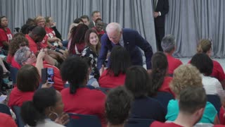Joe Biden creeps out little girl, calls her 'good-looking' while pawing at her