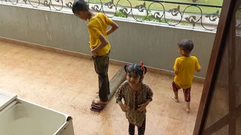 Kids playing in rain