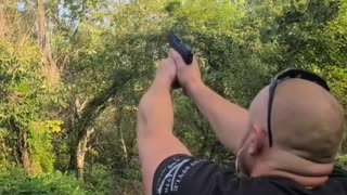 My brother attempted to shoot a quarter with a 22 pistol still a cool video