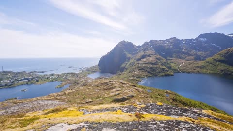 panning shot over lakes and near the village of sorvagen on the lofoten islands norway