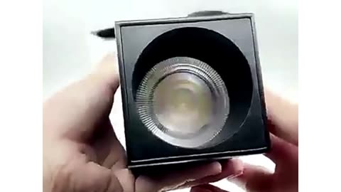 Surface mounted folding spotlight