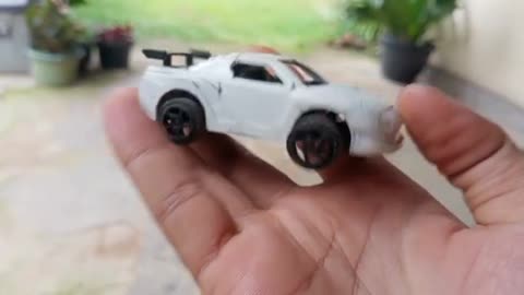 white racing car toy suitable for a great wardrobe decoration