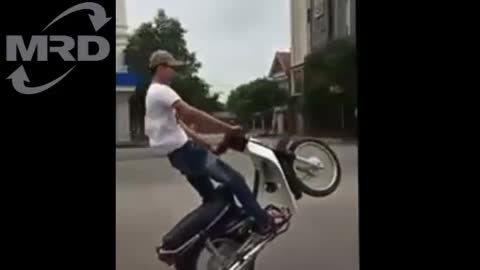 "YOUNG KINGS" How to Wheelie a Motorbike - TROUBLE