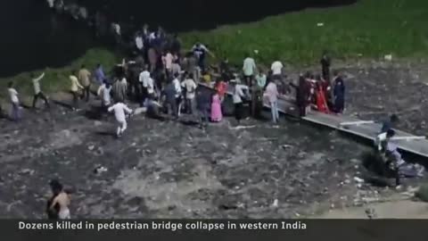 23_Dozens dead after pedestrian bridge collapses in western India