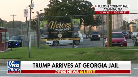 Trump turns himself in at Georgia jail