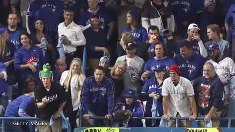 Blue Jays Fan Strips & Runs On Field