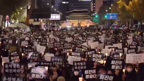 Candlelight vigils are being held to remember the victims of the South Korean Halloween catastrophe