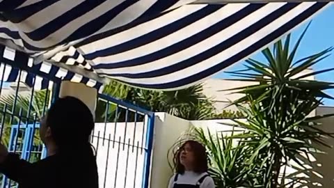 Mom Accidently Splashes Daughter While Cleaning Awning