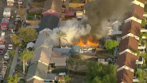 Watch: Crews battle fire at a home in National City