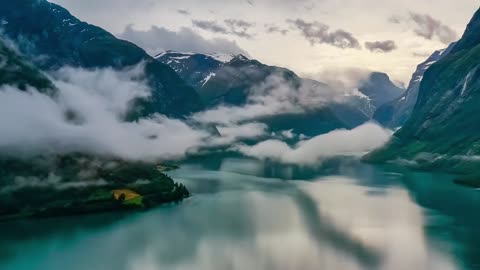 beautiful nature norway natural landscape lovatnet lake flying over the clouds
