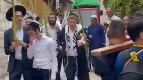 Orthodox Jews were filmed spitting at Christian tourists in the Old City of Jerusalem.